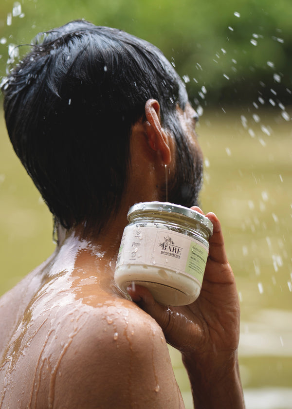 Rainforest Moisturizer lifestyle image with botanical elements. Perfect for men too